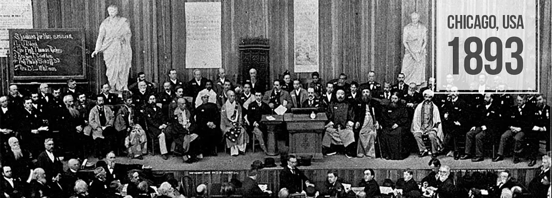 Image courtesy: Parliament of Religions. Chicago, 1893. Swami Vivekananda is seated third from the center (dark robe, white turban).